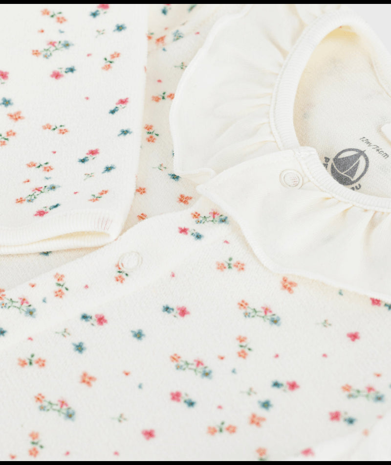 Fluwelen babypyjama met bloemenprint