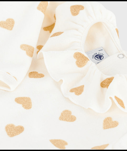 Babypyjama met gouden hartjes