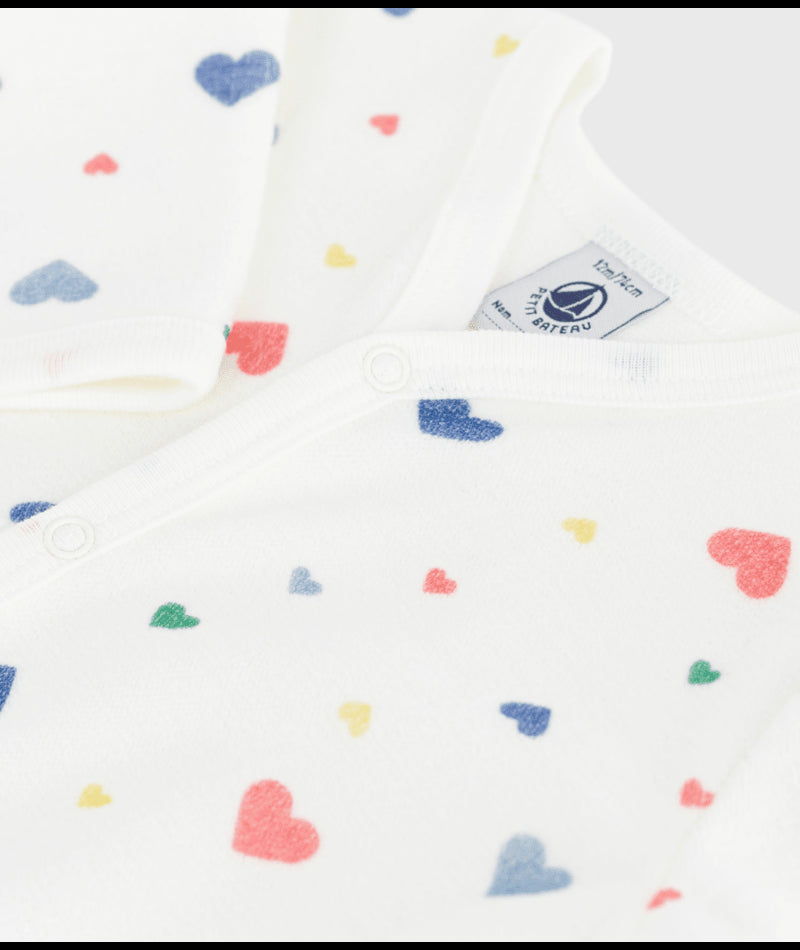 Fluwelen babypyjama (onesie) met hartjesprint