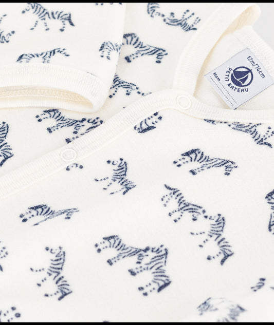 Fluwelen babypyjama met zebraprint